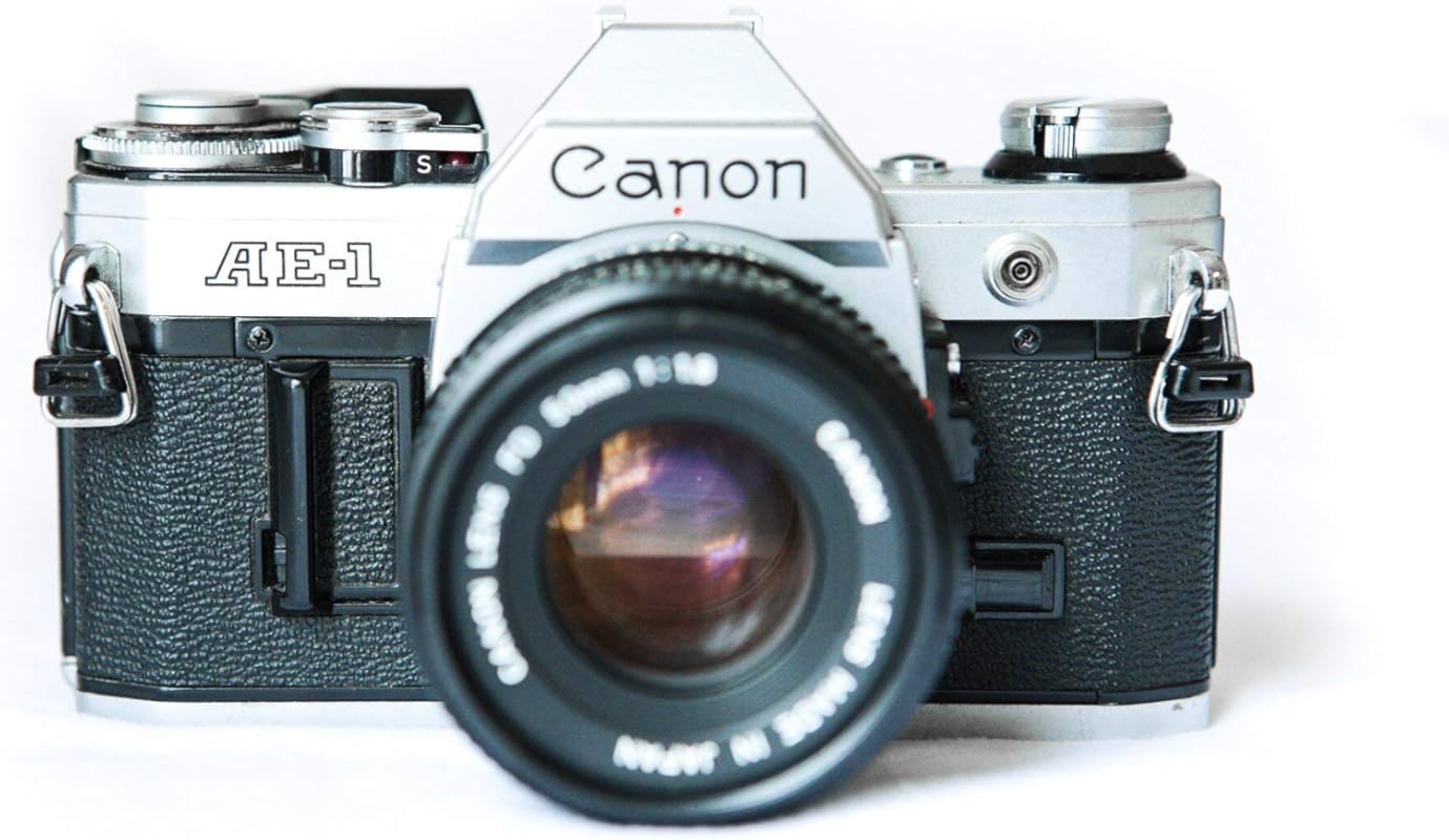 Vintage Canon AE‑1 35mm SLR Camera with Fast 50mm f/1.8 Lens – Fully R